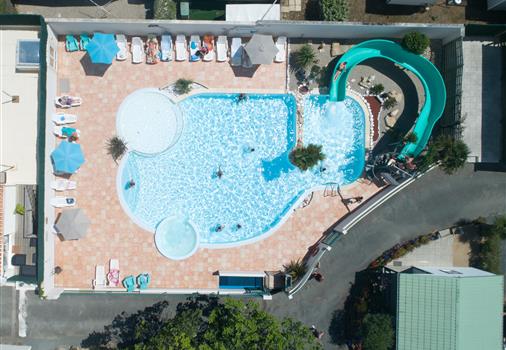 swimming pool seen from the sky - Aquatic area at the campsite Les Tulipes, camping with heated pool, jacuzzi, water slides and paddling pool, campsite on the seafront at La Faute sur Mer near the Tranche sur Mer in Vendée