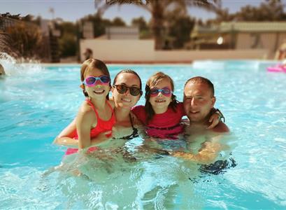 Water park at the campsite 2 stars Les Tulipes, heated pool, jacuzzi, water slide and paddling pool - Camping les tulipes